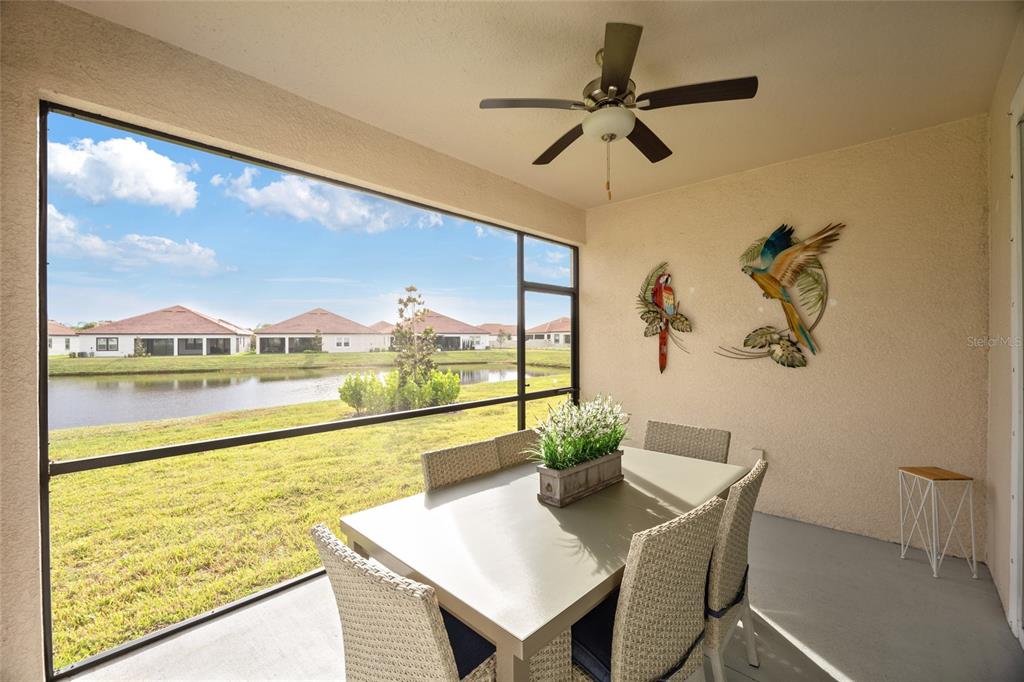 5513 Little Path Drive Wimauma, FL 33598 - Photo 32 of 40 a view of a dining room with furniture window and outside view