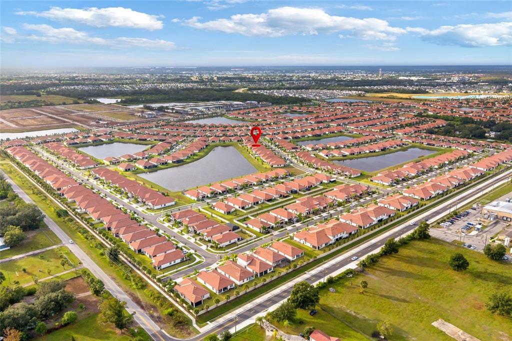 5513 Little Path Drive Wimauma, FL 33598 - Photo 38 of 40 an aerial view of residential building with an ocean view