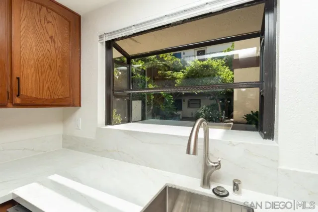 a view of an empty room with a bathroom