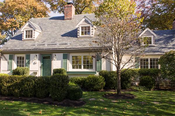10 Cushing Road Wellesley, MA 02481 - Photo 1 of 20 a front view of a house with a yard