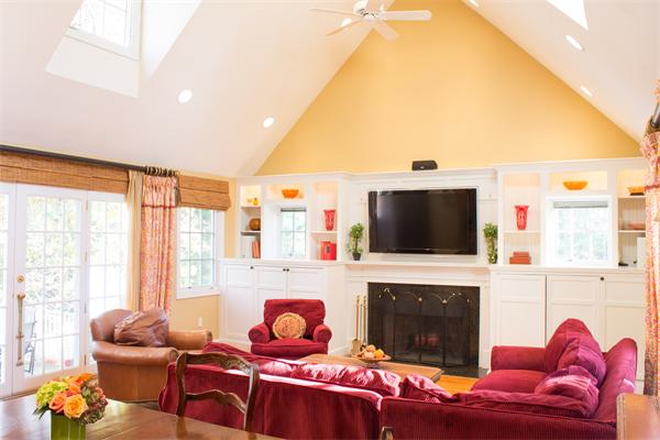 10 Cushing Road Wellesley, MA 02481 - Photo 11 of 20 a living room with furniture a fireplace and a flat screen tv