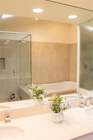 10 Cushing Road Wellesley, MA 02481 - Photo 15 of 20 a bathroom with a bathtub and shower
