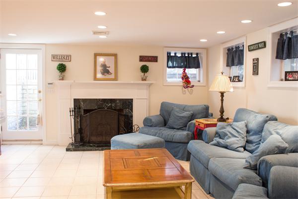 10 Cushing Road Wellesley, MA 02481 - Photo 17 of 20 a living room with furniture and a fireplace