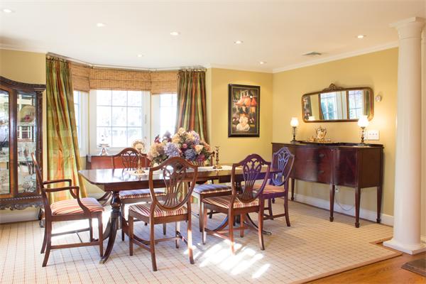 10 Cushing Road Wellesley, MA 02481 - Photo 3 of 20 a view of a dining room with furniture and a window