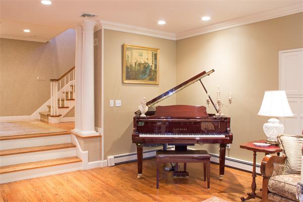 10 Cushing Road Wellesley, MA 02481 - Photo 7 of 20 a view of entryway dining room and hall with wooden floor