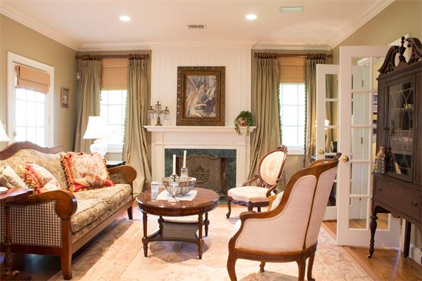 10 Cushing Road Wellesley, MA 02481 - Photo 8 of 20 a living room with furniture fireplace and a large window
