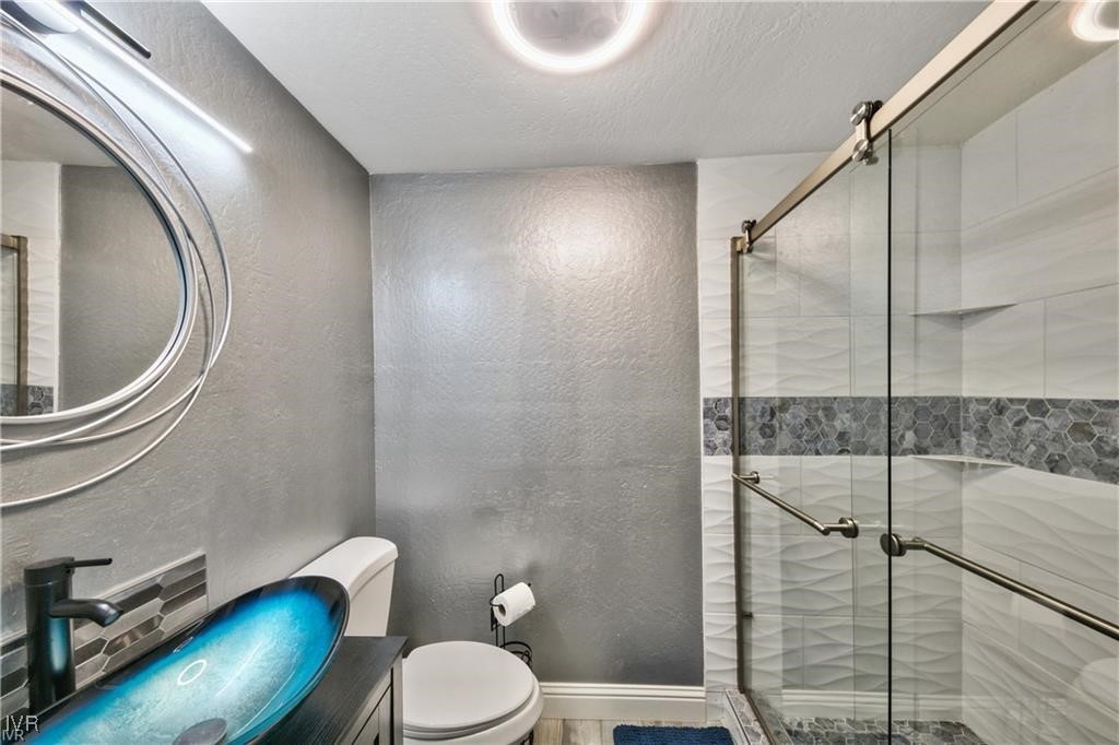 807 Alder Avenue, Unit 38 Incline Village, NV 89451 - Photo 11 of 14 a bathroom with a toilet and a shower
