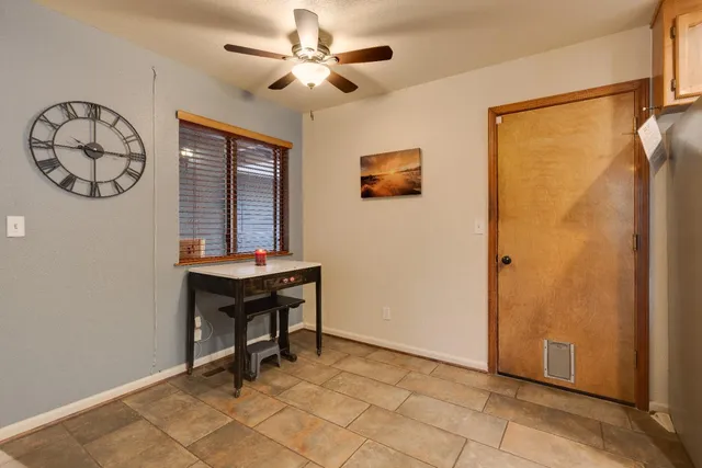 a view of a hallway with seating area
