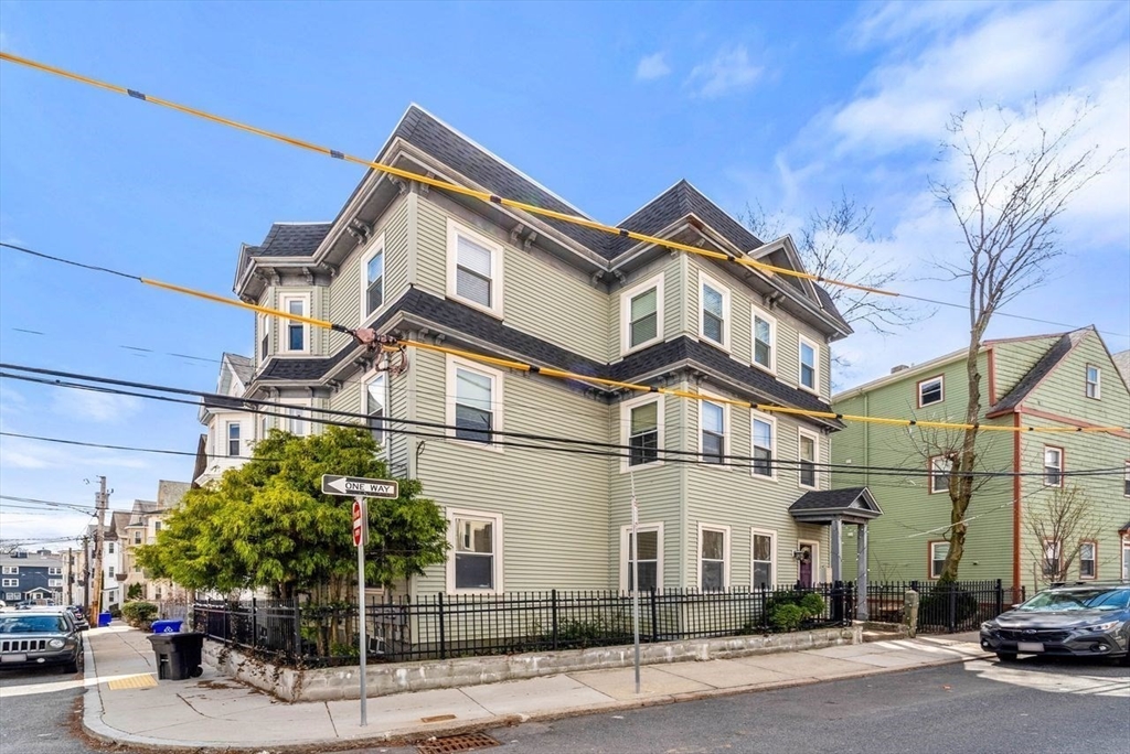 26 Armstrong Street, Unit 3 Boston, MA 02130 - Photo 11 of 17 a view of a street with a building in the background