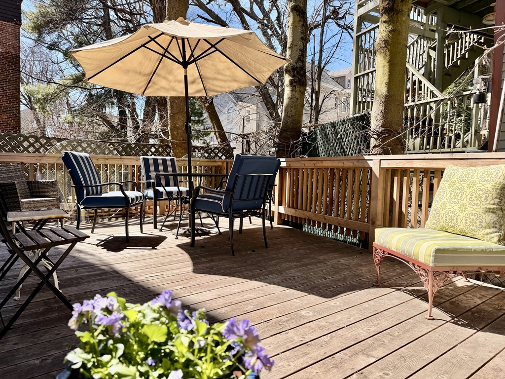26 Armstrong Street, Unit 3 Boston, MA 02130 - Photo 17 of 17 a view of a chairs and table in the patio