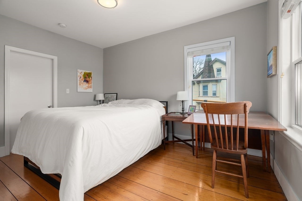 26 Armstrong Street, Unit 3 Boston, MA 02130 - Photo 8 of 17 a bedroom with a bed and a window