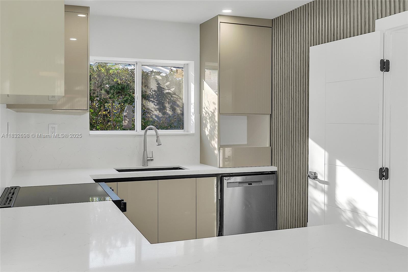 6540 Southwest 25th Street Miami, FL 33155 - Photo 11 of 37 a kitchen with a sink and a window