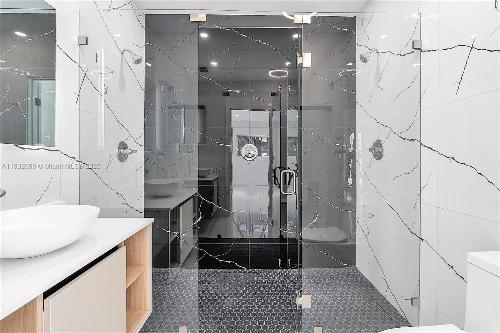 6540 Southwest 25th Street Miami, FL 33155 - Photo 15 of 37 a bathroom with a sink a toilet and shower