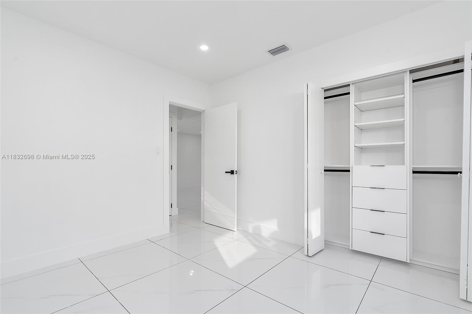 6540 Southwest 25th Street Miami, FL 33155 - Photo 21 of 37 a view of an empty walk in closet