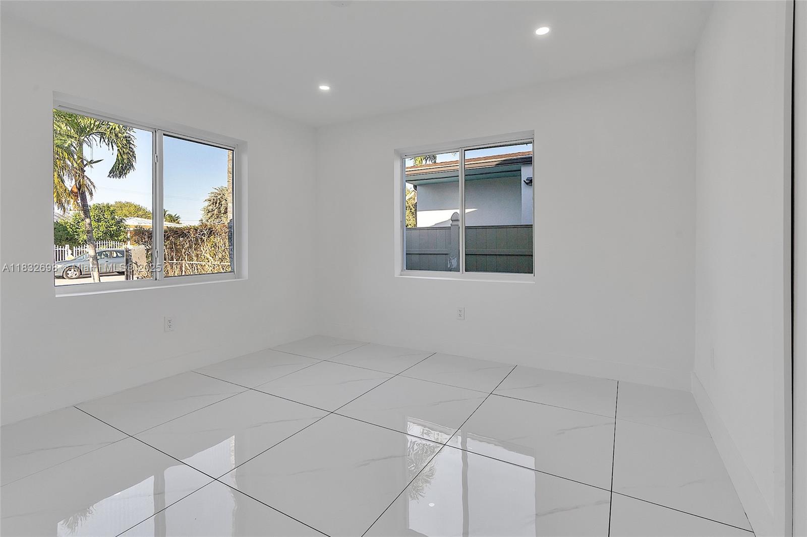 6540 Southwest 25th Street Miami, FL 33155 - Photo 22 of 37 a view of an empty room with a window