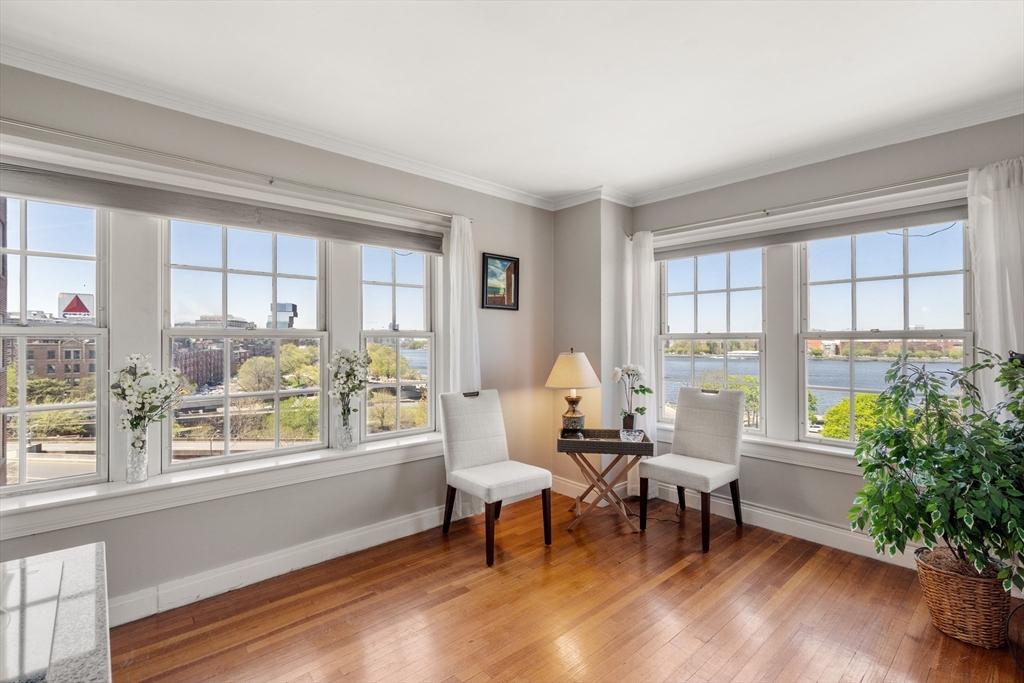 534 Beacon Street, Unit 707 Boston, MA 02215 - Photo 1 of 16 a living room with furniture and a window