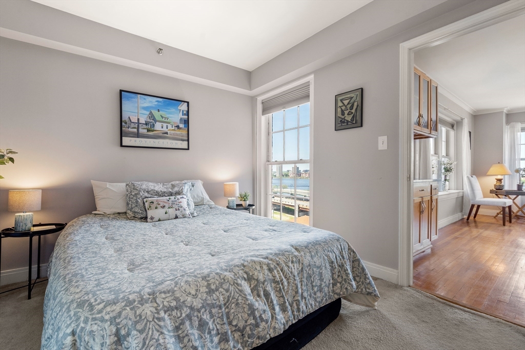 534 Beacon Street, Unit 707 Boston, MA 02215 - Photo 11 of 16 a bedroom with a bed and a view of bedroom