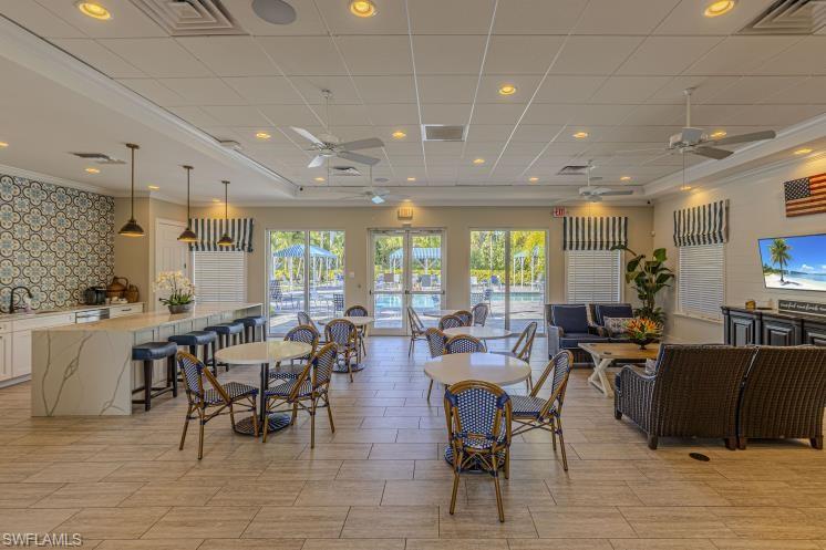 2199 Marquesa Circle Naples, FL 34112 - Photo 22 of 26 Dining room featuring crown molding