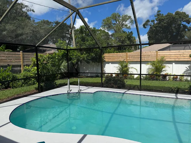 a utility room with washer and dryer