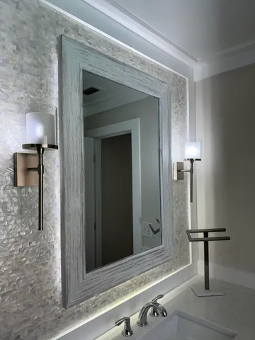 view of hall way with mirror