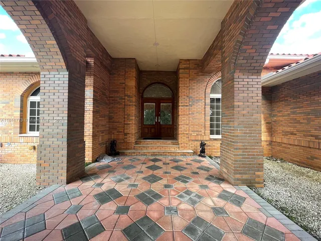 a view of entrance door of house