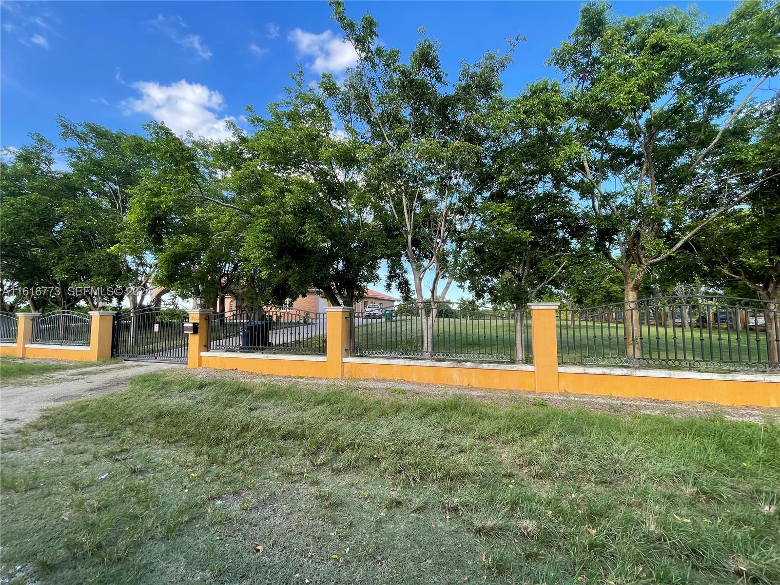 31002 Southwest 212th Avenue Homestead, FL 33030 - Photo 29 of 30 a swimming pool with an outdoor space and seating space