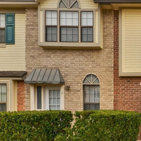202 South College Street, Unit 8 Georgetown, TX 78626 - Photo 2 of 40 Entrance to property with brick siding