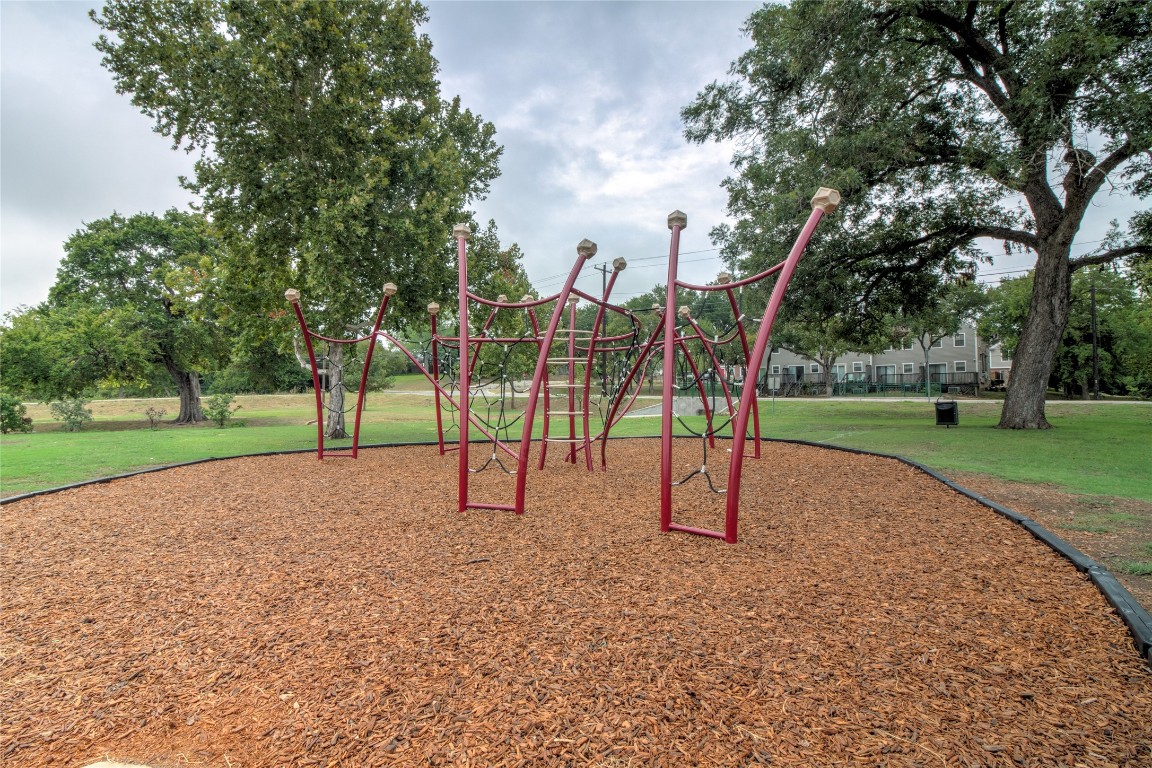 202 South College Street, Unit 8 Georgetown, TX 78626 - Photo 33 of 40 Community jungle gym with a lawn