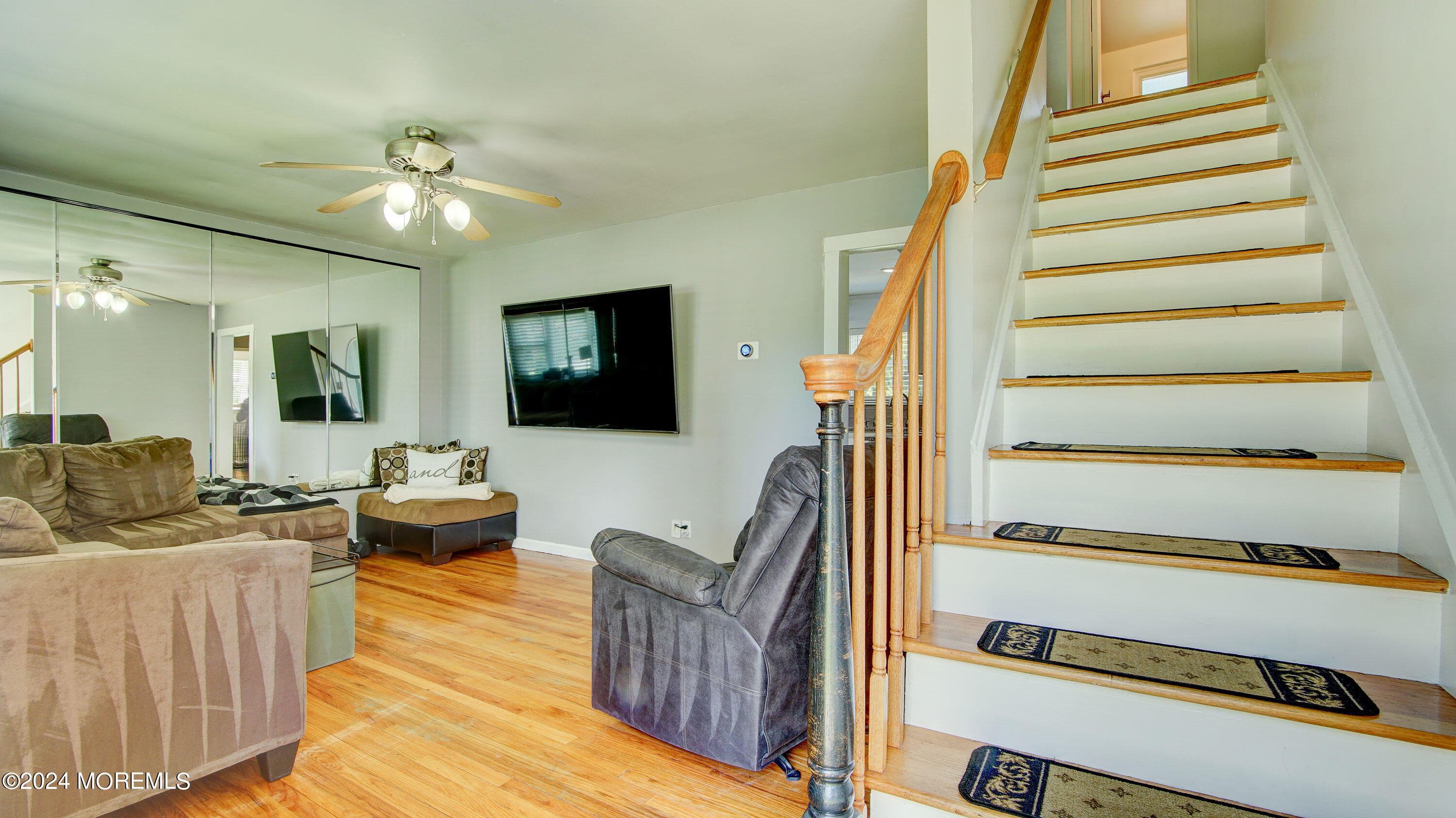 325 Aldrich Road Howell, NJ 07731 - Photo 2 of 19 a living room with furniture and a flat screen tv