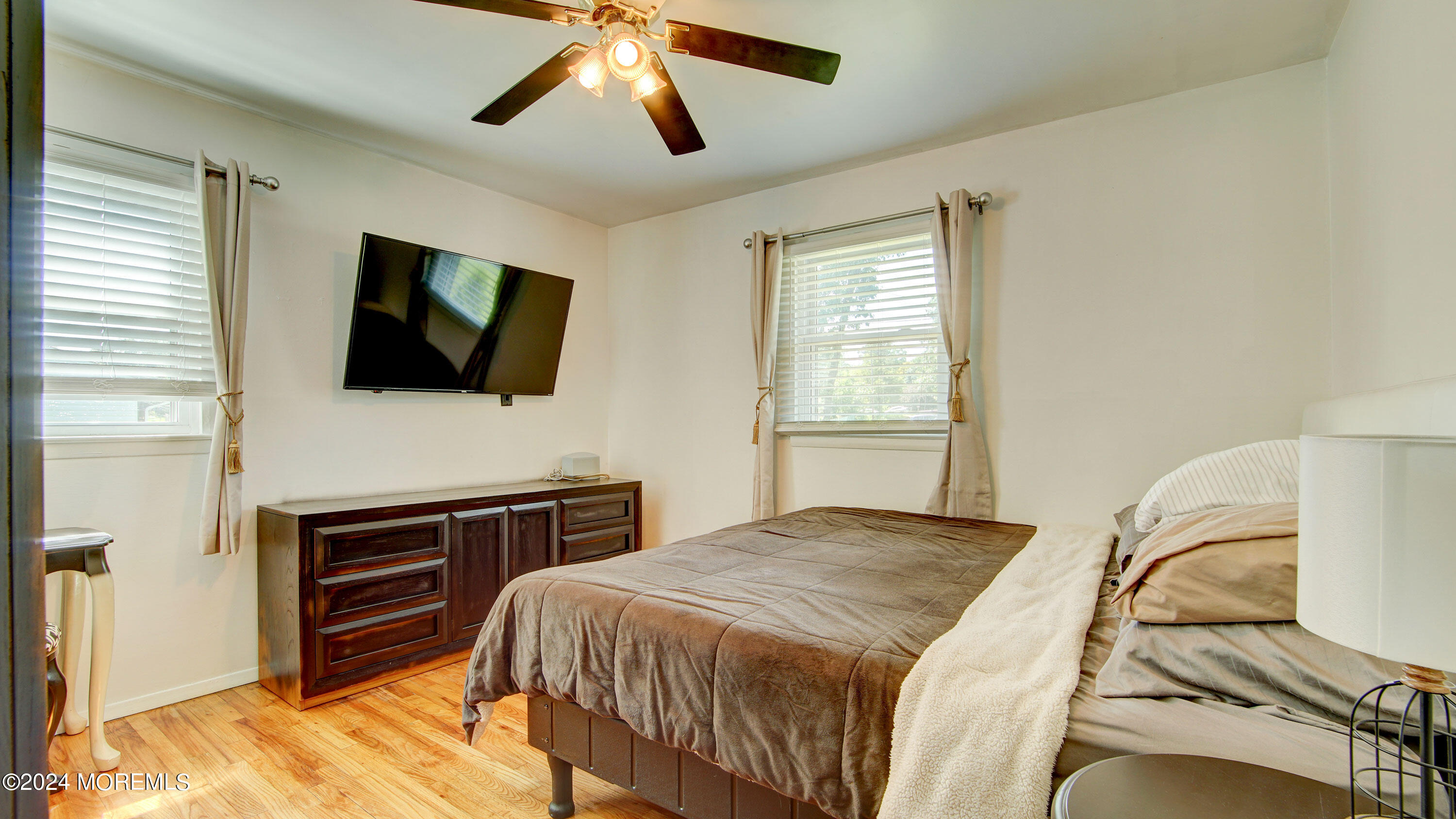 325 Aldrich Road Howell, NJ 07731 - Photo 10 of 19 a bedroom with a bed and a flat screen tv