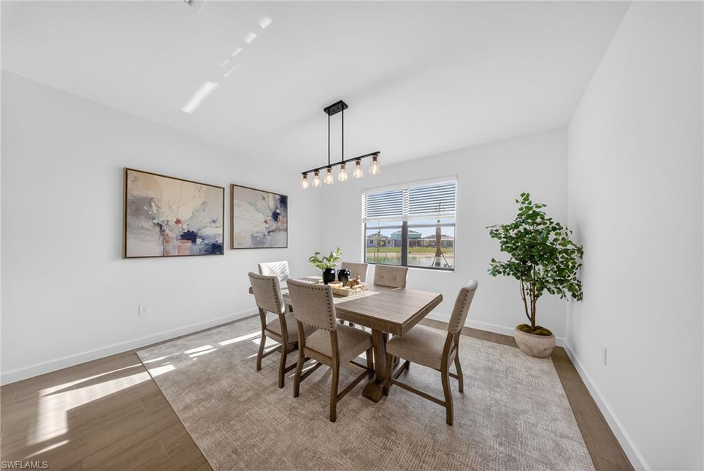 21082 Verawood Loop Estero, FL 33928 - Photo 13 of 50 a dining room with furniture and window