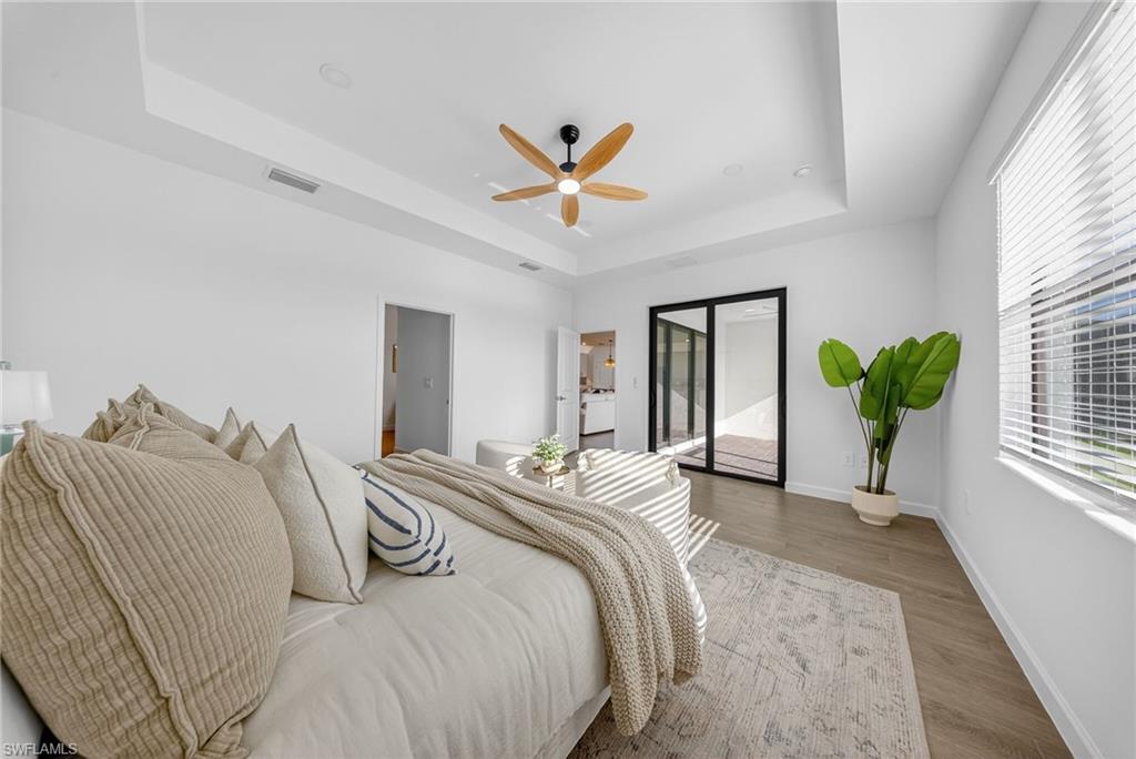 21082 Verawood Loop Estero, FL 33928 - Photo 20 of 50 a bedroom with bed and a window