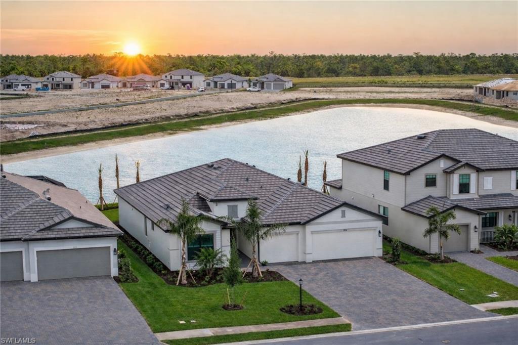 21082 Verawood Loop Estero, FL 33928 - Photo 35 of 50 a view of a house with outdoor space and lake view