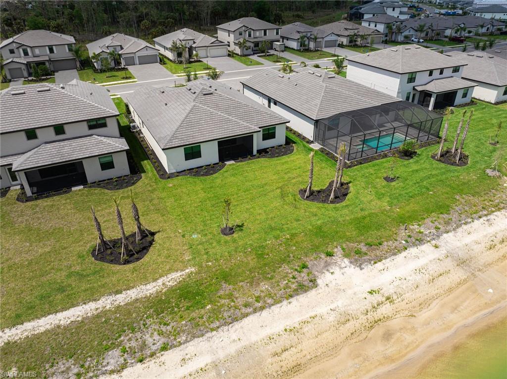 21082 Verawood Loop Estero, FL 33928 - Photo 39 of 50 an aerial view of residential houses with yard