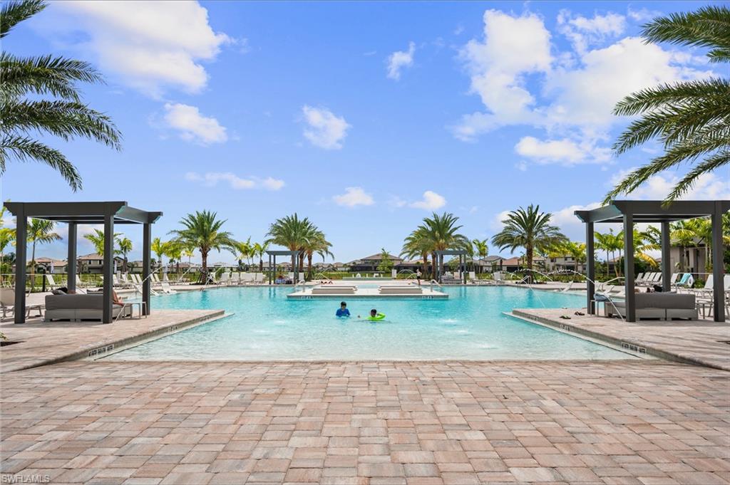 21082 Verawood Loop Estero, FL 33928 - Photo 42 of 50 a view of swimming pool with outdoor seating