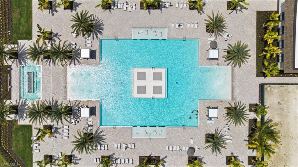 21082 Verawood Loop Estero, FL 33928 - Photo 43 of 50 an aerial view of a house with a yard and palm tree