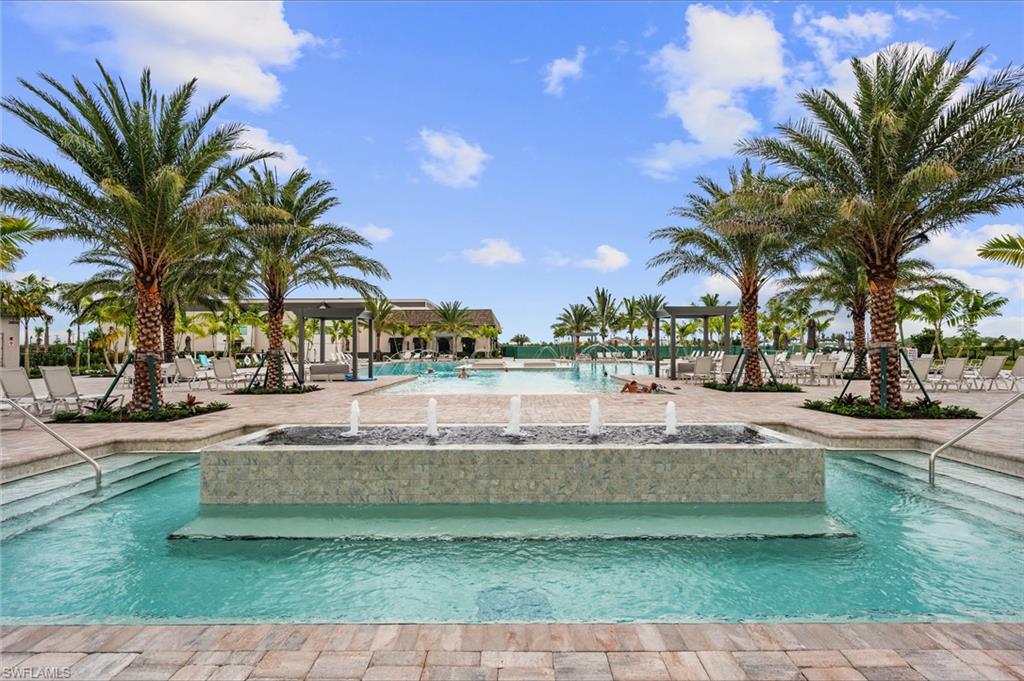 21082 Verawood Loop Estero, FL 33928 - Photo 44 of 50 a view of a swimming pool with palm trees