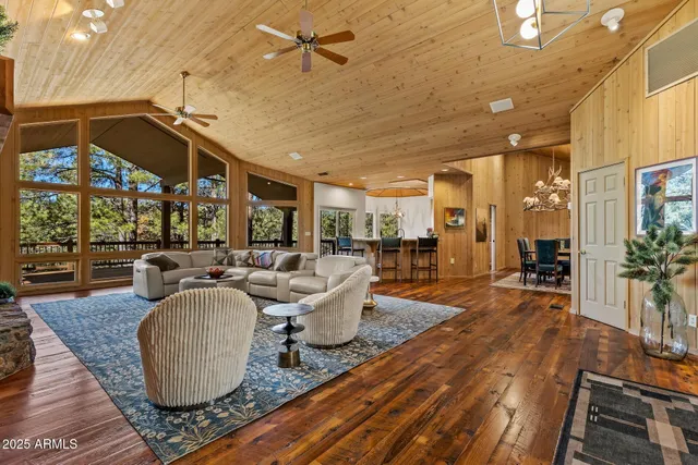 a kitchen with center island and stainless steel appliances