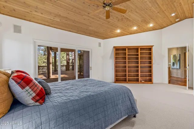 a bathroom with a shower sink and mirror