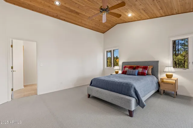 a spacious bathroom with a tub and shower