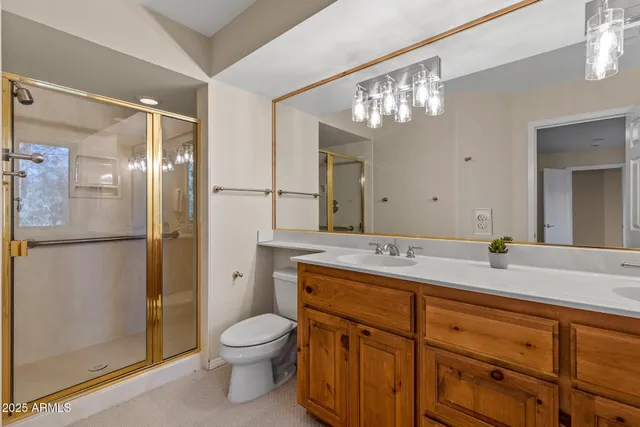 a bedroom with a bed and a lamp