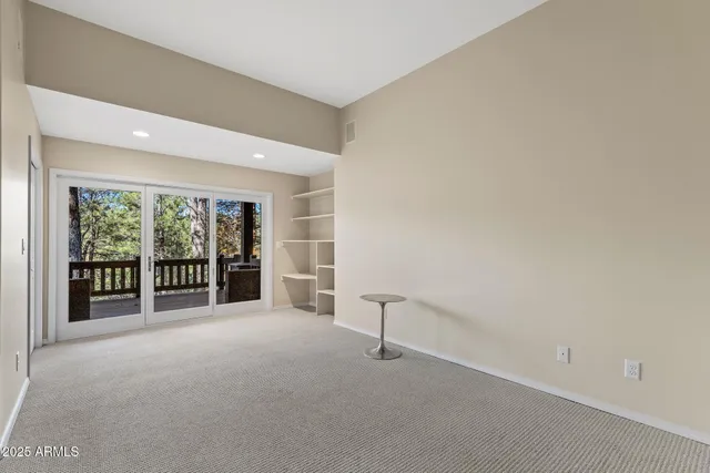 a house with trees in the background