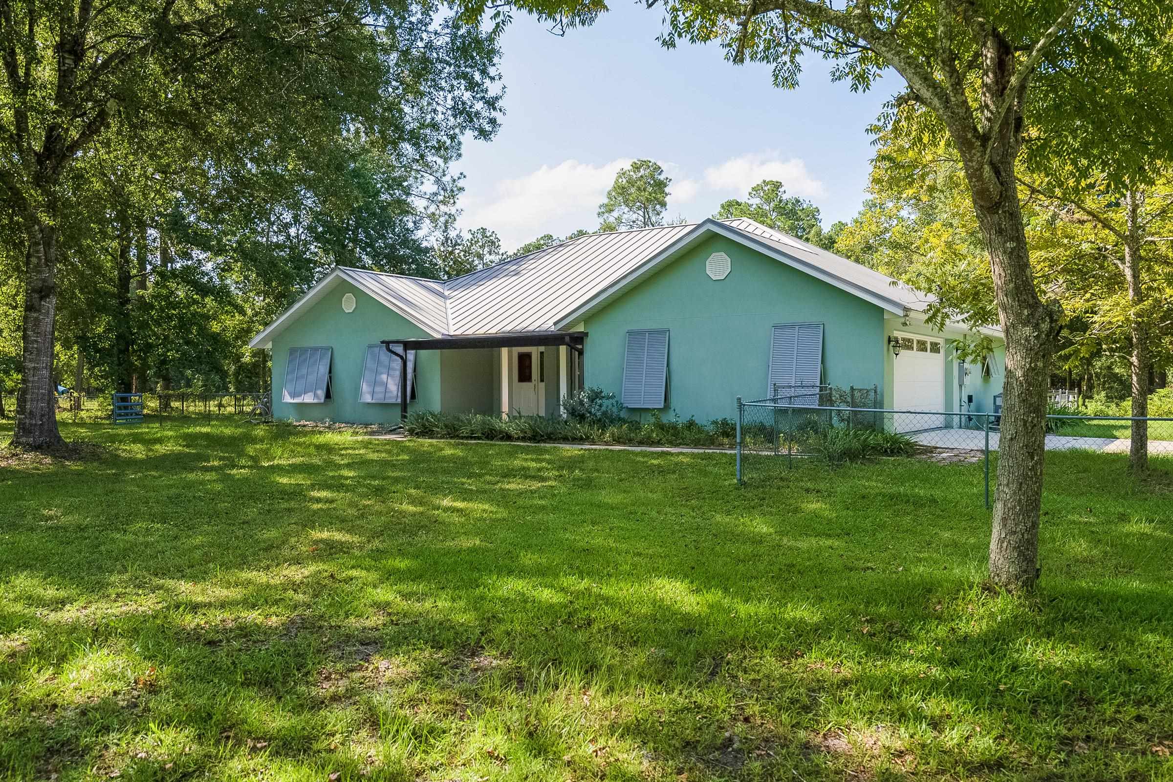 5035 Scaff Road St. Augustine, FL 32092 - Photo 54 of 56 a front view of house with yard and green space