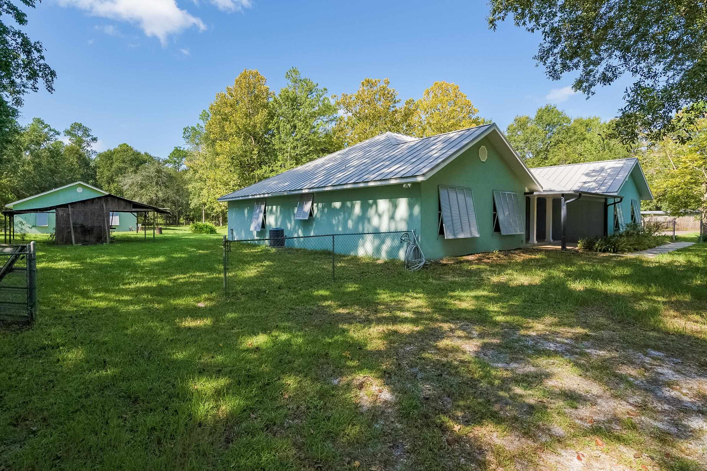 5035 Scaff Road St. Augustine, FL 32092 - Photo 56 of 56 a front view of a house with garden