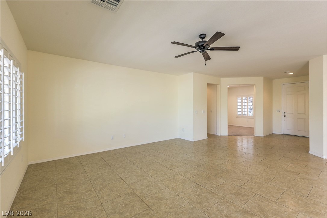 2276 Saxtons River Road Henderson, NV 89044 - Photo 3 of 49 Spacious Great Room with Ceiling Fan and Tile Flooring