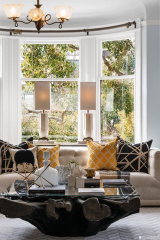 a living room with furniture and a window