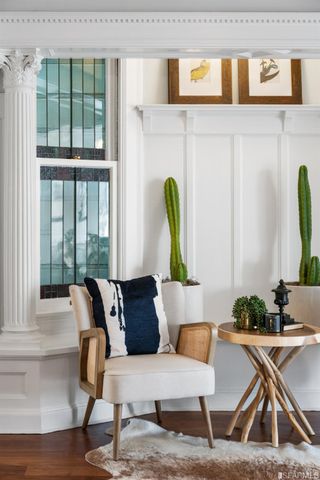 a view of a livingroom with furniture and window