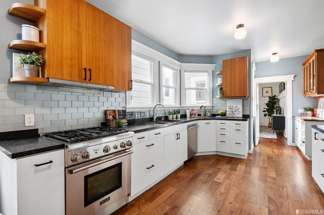 a bedroom with bed and window