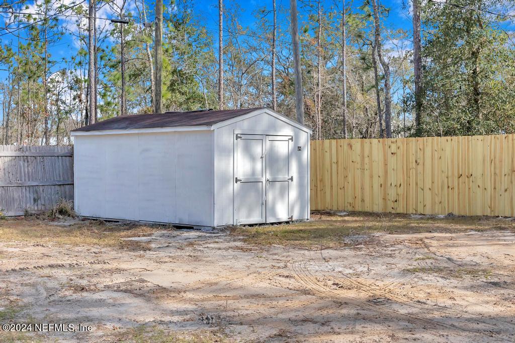 3308 Thunder Road Middleburg, FL 32068 - Photo 30 of 39 a view of a small yard