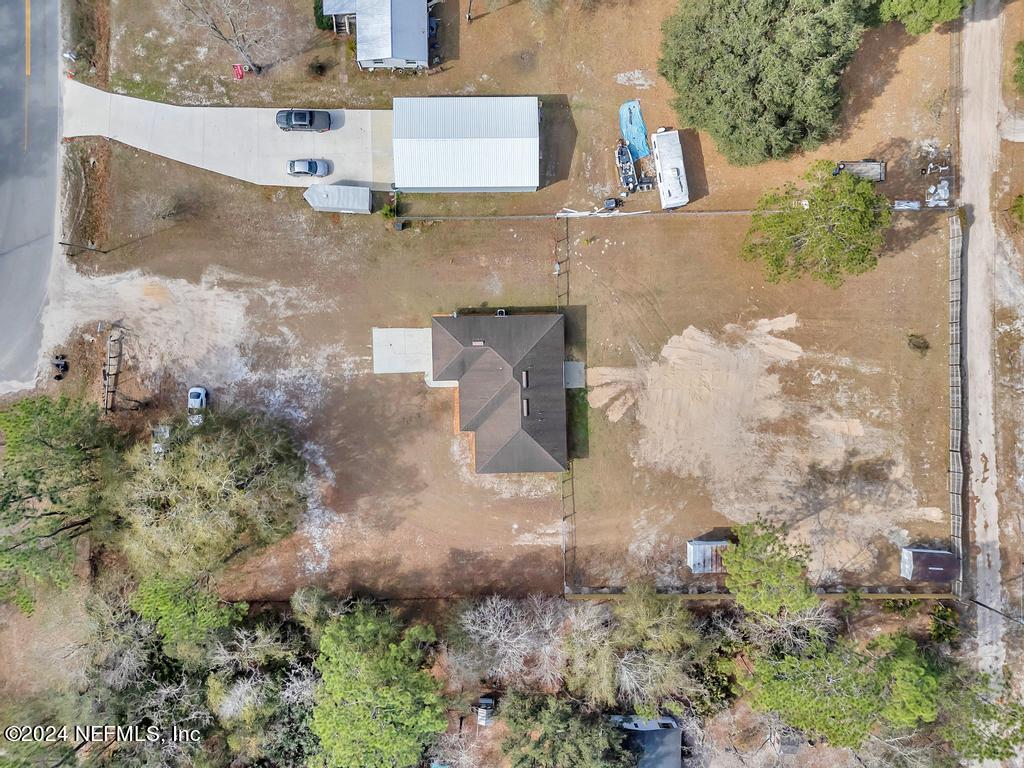 3308 Thunder Road Middleburg, FL 32068 - Photo 34 of 39 an aerial view of residential houses with outdoor space